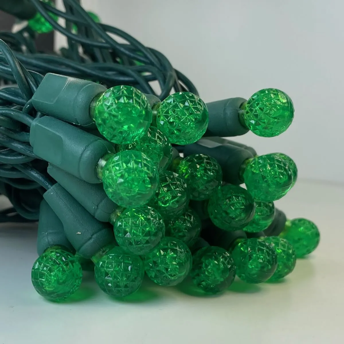 50-light  G12 Green LED Christmas Lights, 4" Spacing Green Wire