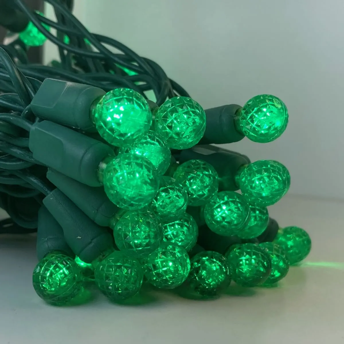 50-light  G12 Green LED Christmas Lights, 4" Spacing Green Wire