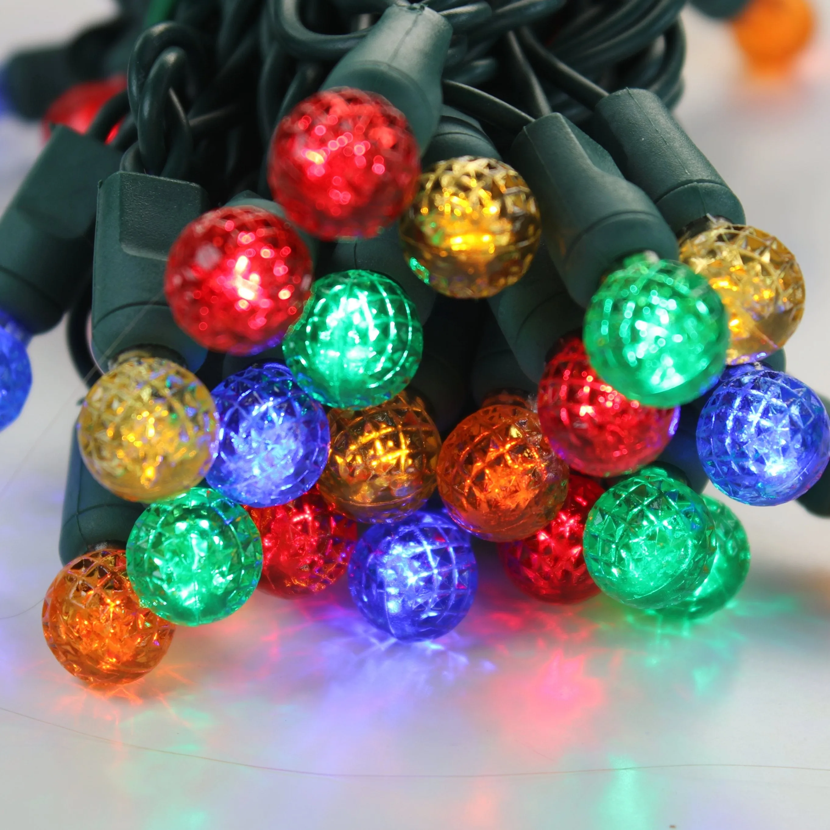 50-light  G12 Multicolor LED Christmas Lights, 4" Spacing Green Wire